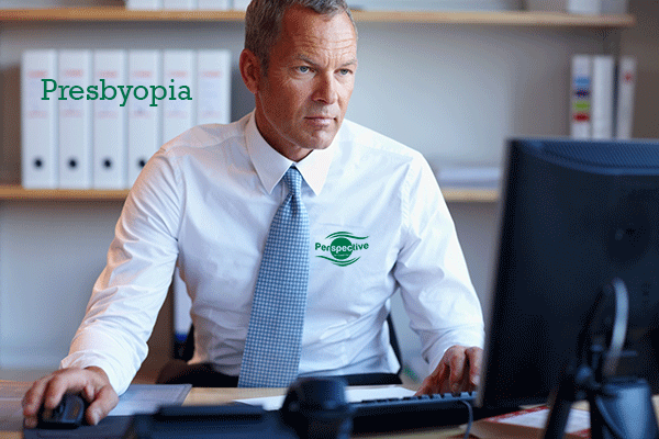 Presbyopia - man in his 40s at the computer